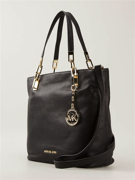 michael kors black purse large hang|Michael Kors original bag.